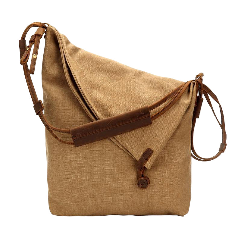 Dame bohemsk crossbody veske i lerret og skinn, perfekt for hverdag og festivalbruk. Romslig og stilfull.