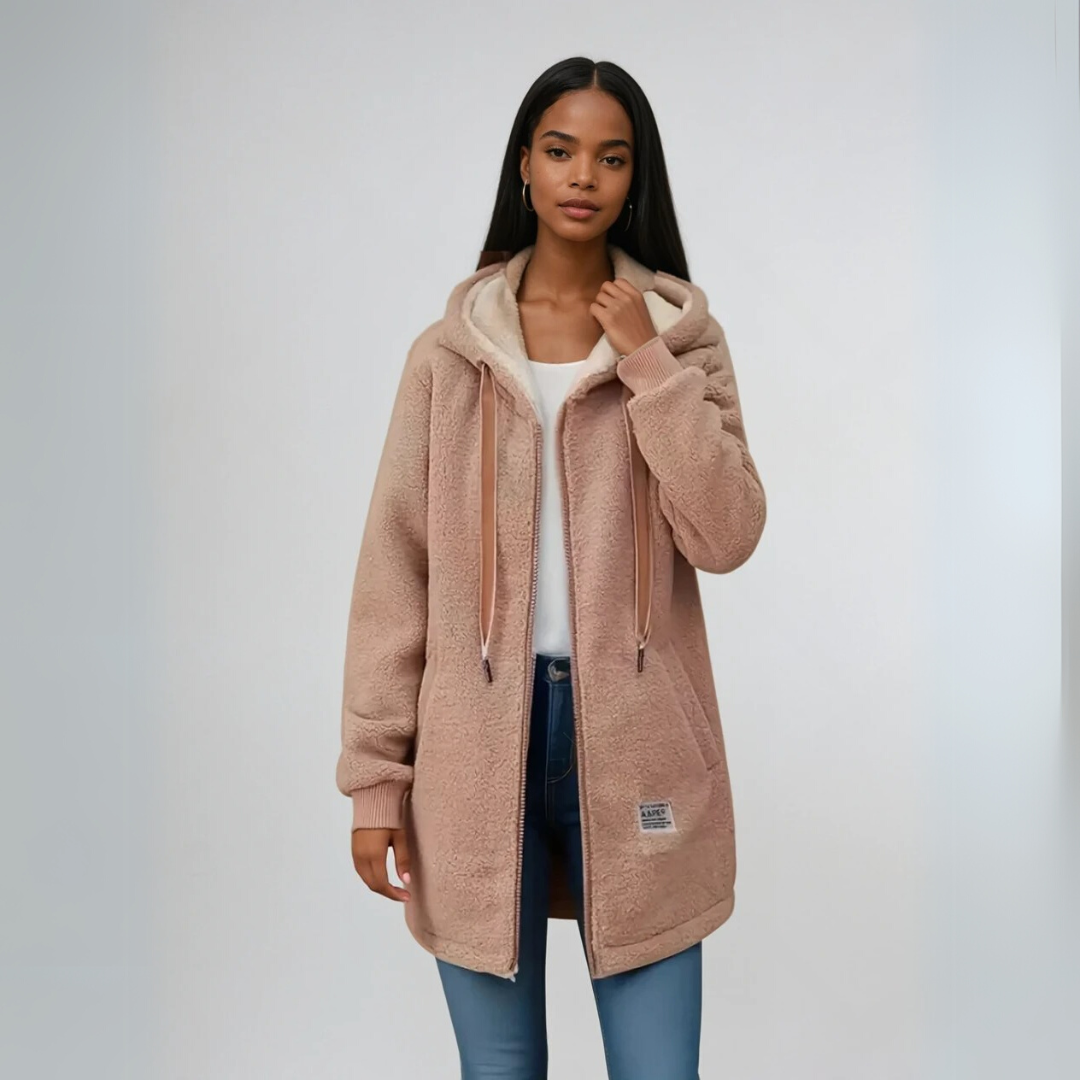 Avslappet og koselig dame fleecejakke i oversized modell, med varmt sherpafôr. Ideell for høst og vinter.