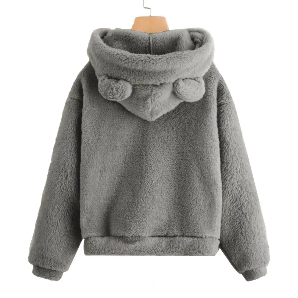 Komfortabel dame hettegenser med kaninører i mykt stoff. Ideell for avslappet stil og fritid. Langermet koselig genser.