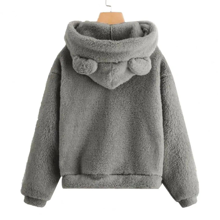 Komfortabel dame hettegenser med kaninører i mykt stoff. Ideell for avslappet stil og fritid. Langermet koselig genser.