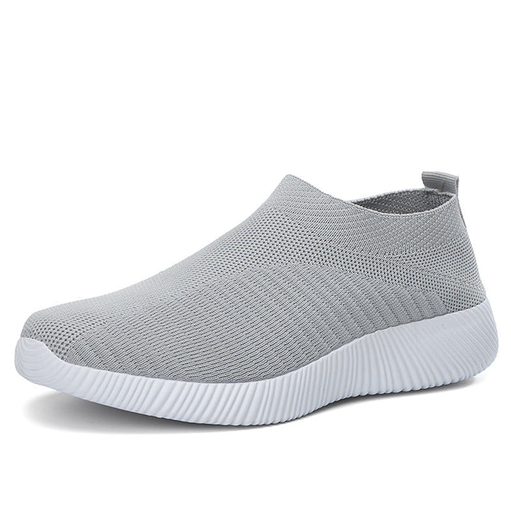 Dame slip-on joggesko for komfortabel hverdagsbruk, lett og pustende design.