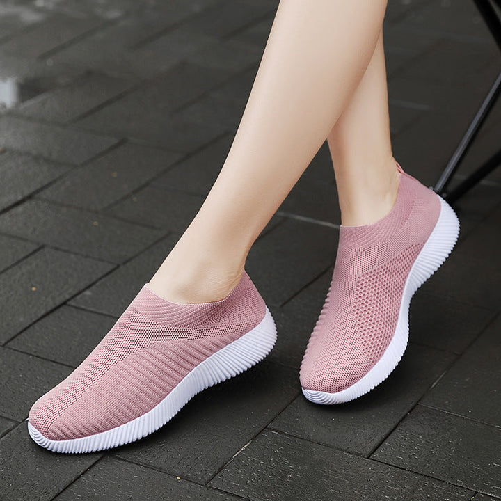 Enkel slip-on joggesko for dame, pustende og lett, ideell for fritid og hverdags.