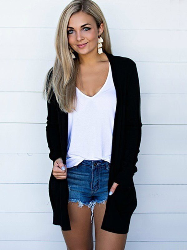 Elegant kvinnecardigan, langermet strikket design. Komfortabel og allsidig for lag-på-lag stil vår/sommer.