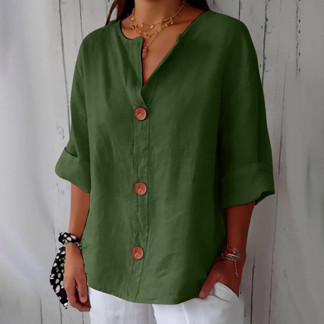 Uformell elegant damebluse, perfekt for hverdagsbruk med avslappet passform og feminin look.