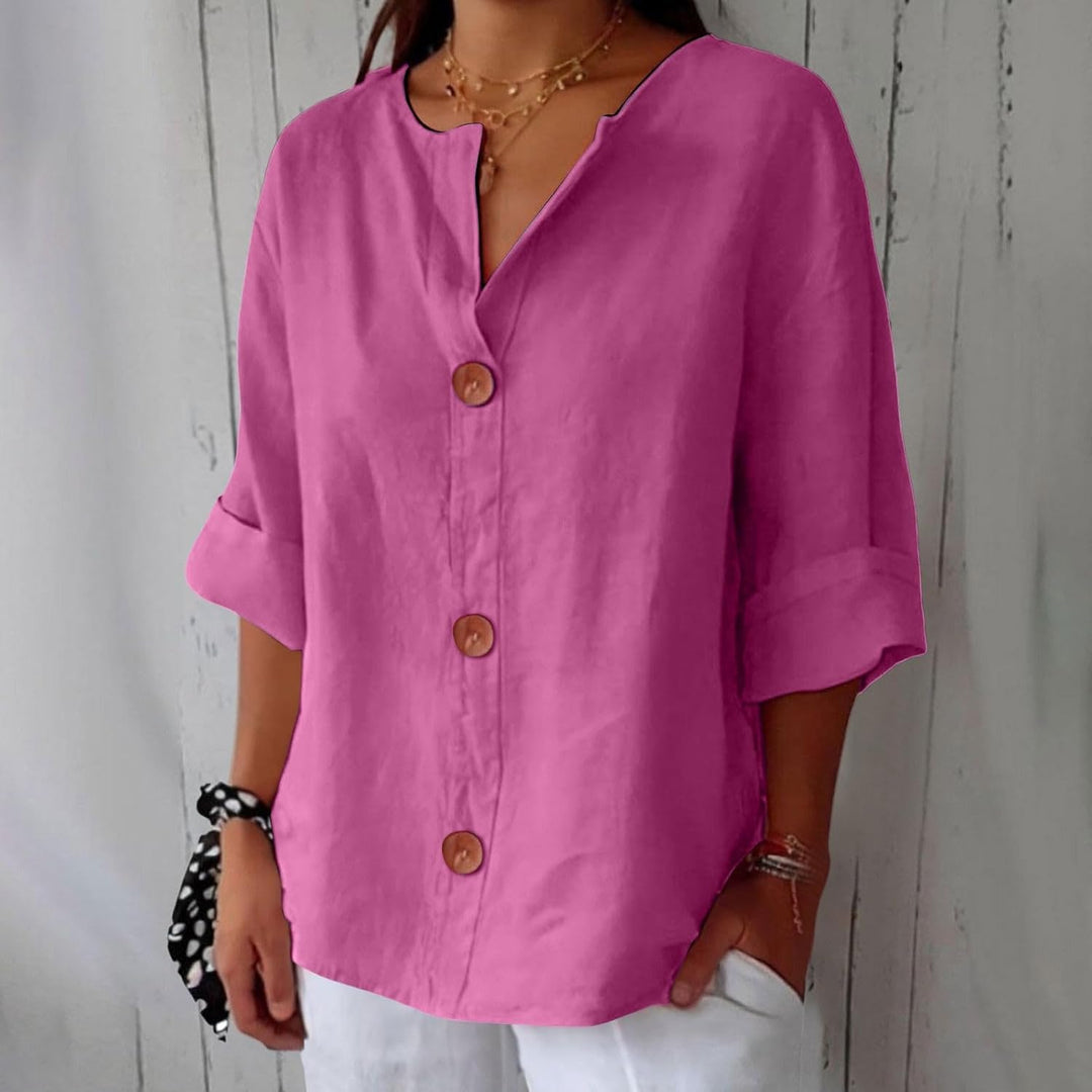 Komfortabel flerfarget damebluse med avslappet passform, ideell for en stilfull og uanstrengt sommerlook.