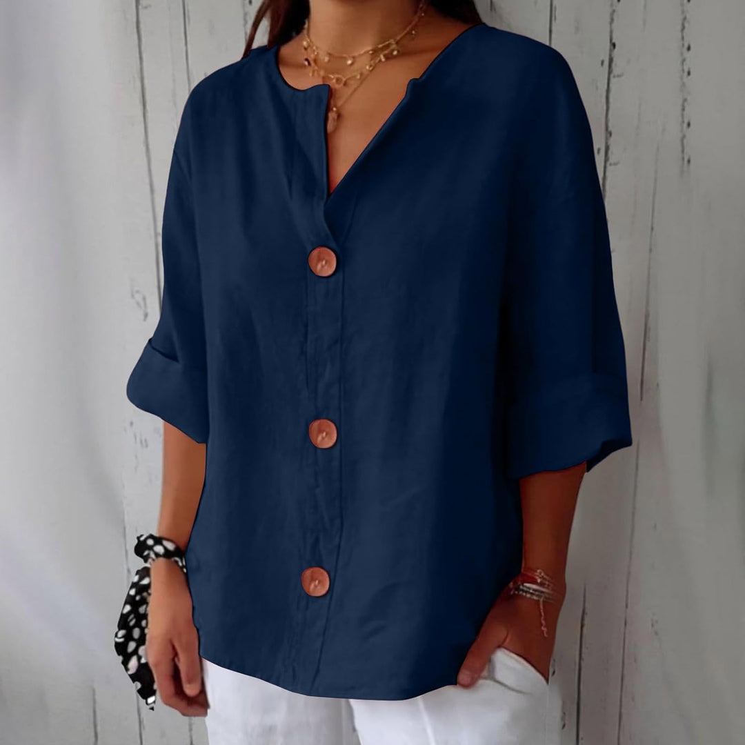 Stilfull dame overdel, en elegant sommerbluse med avslappet passform og moderne design.