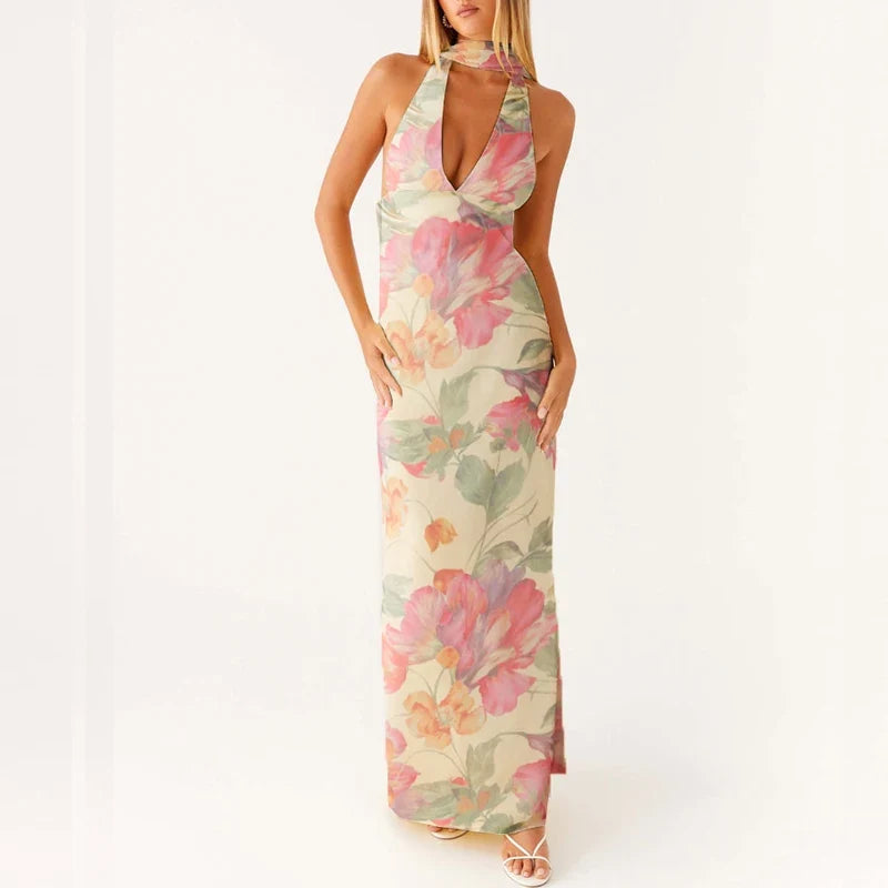 Kvinner sin elegante halterneck maxikjole, perfekt som sommerkjole og festkjole. Komfortabel løs passform.