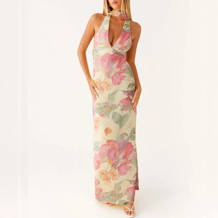 Kvinner sin elegante halterneck maxikjole, perfekt som sommerkjole og festkjole. Komfortabel løs passform.
