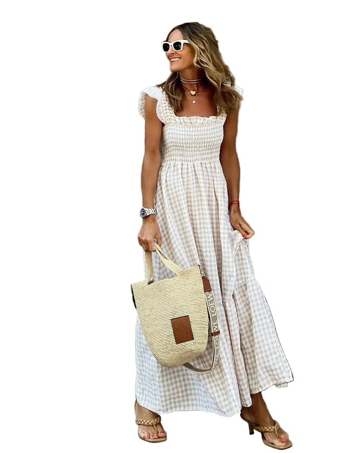 Dame maxikjole med rufflede ermer. Komfortabel og elegant sommerkjole.