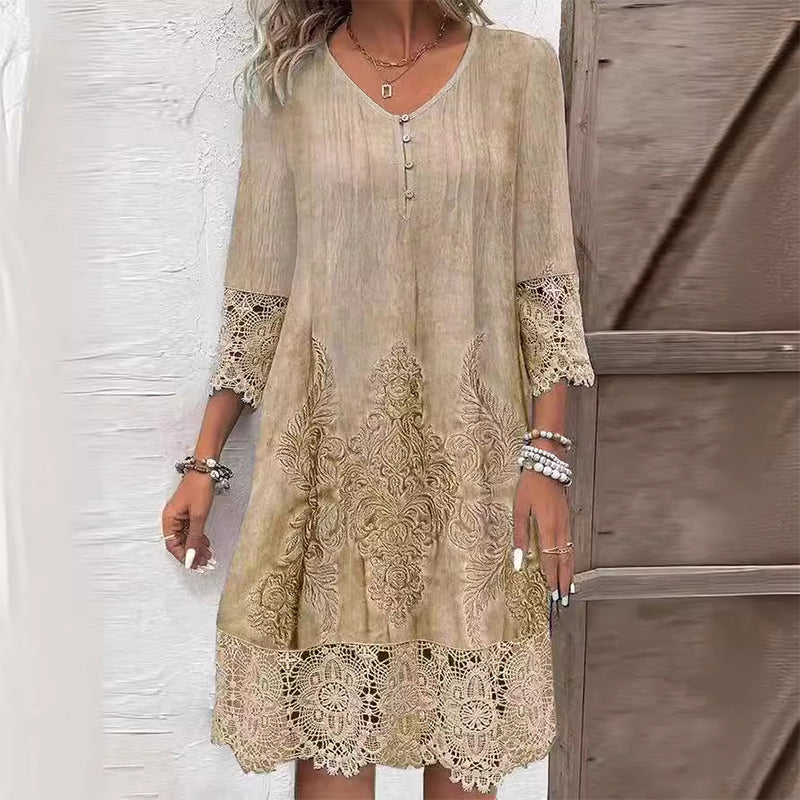 Damekjole i midi-lengde med blomstermønster og broderi. En allsidig festkjole eller elegant vårkjole.