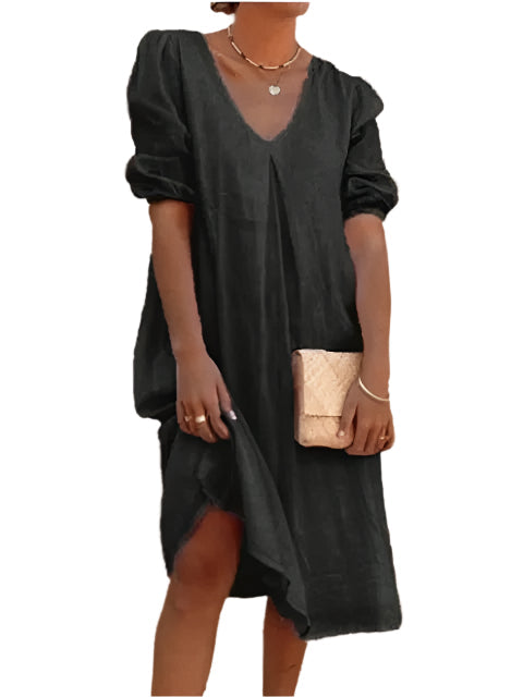 Elegant midikjole for dame i moderne stil, perfekt for enhver anledning.