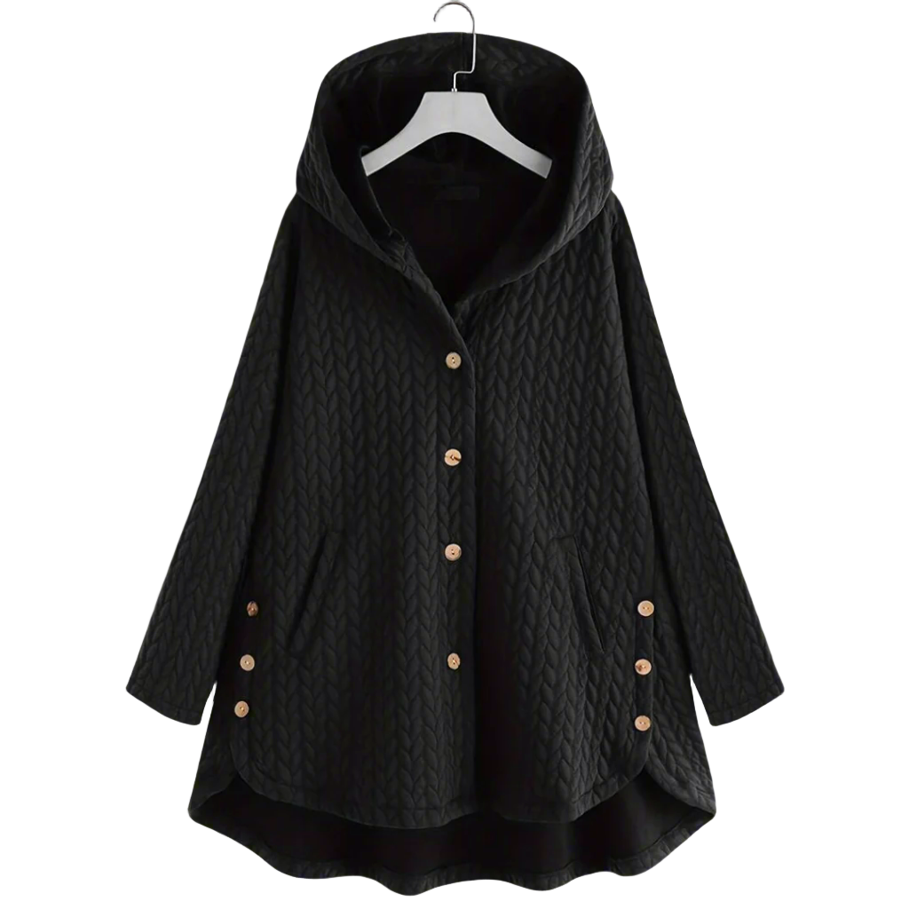 Oversized quiltet damejakke med hette og asymmetrisk kant. Varm polstret vinterjakke i moderne design.