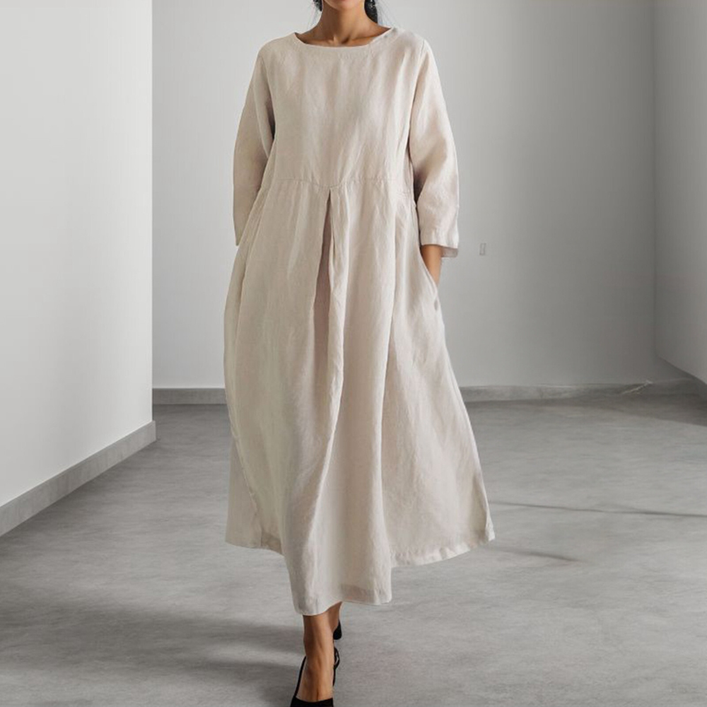 Elegant sommerkjole med flatterende snitt, en allsidig damekjole for både hverdag og festlig sommerstil.