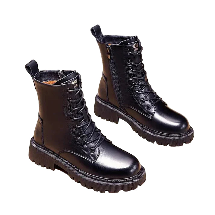 Dame vinterstøvler i brunt skinn, varmt fôr, elegant design. Perfekt for snø og vintervær.