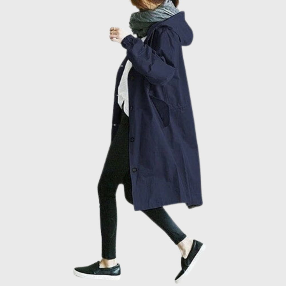 Moderne damejakke; en vanntett trenchcoat med tidløst snitt, perfekt for formelle og fritidsantrekk.