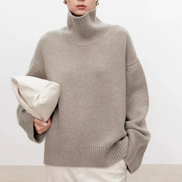 Elegant svart damegenser med turtleneck, et tidløst plagg for høst- og vintergarderoben. Varm & stilfull.