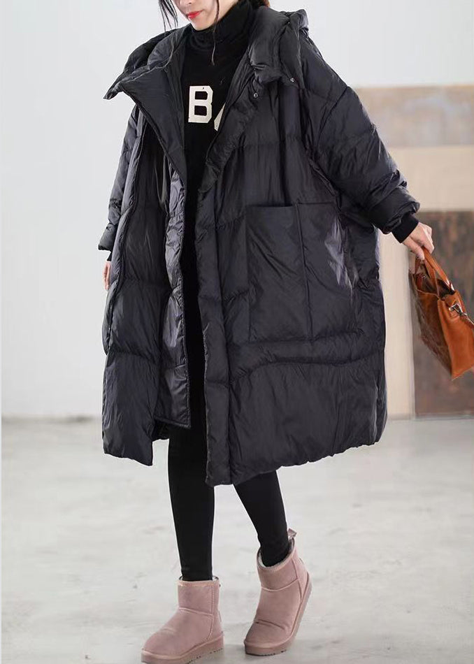 Varm hettejakke for dame i elegant stil, perfekt yttertøy for en komfortabel og trendy vinter.