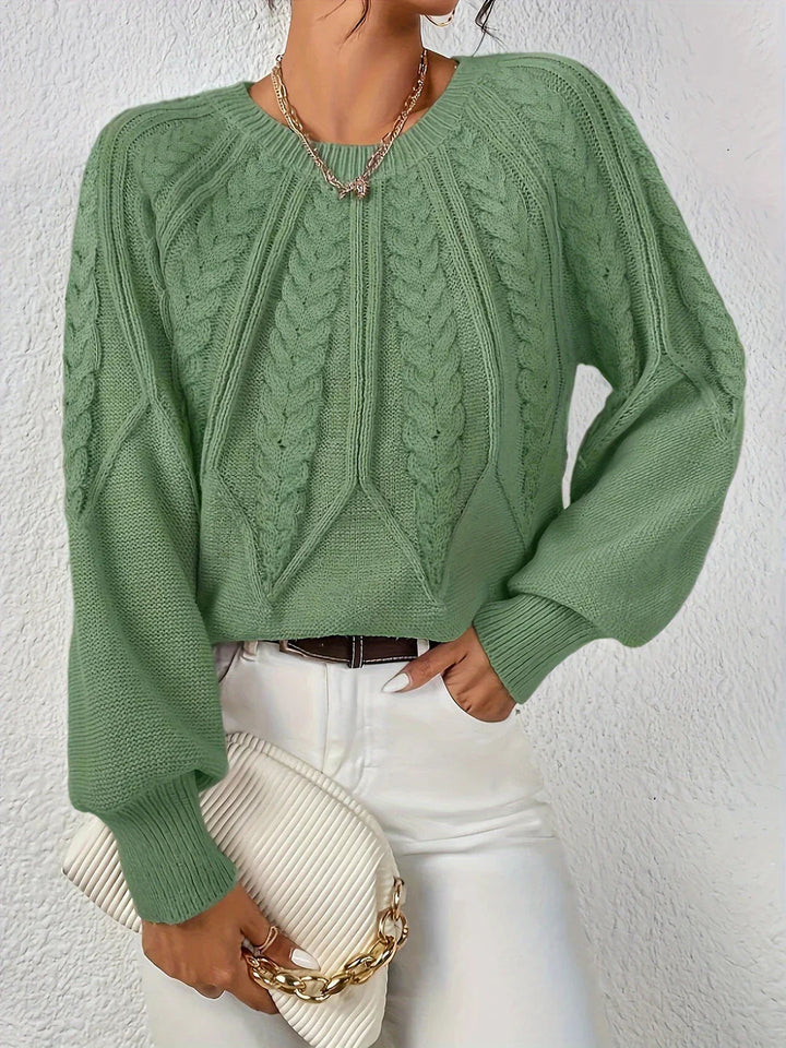 Tidløs damegenser i klassisk stil, ideell for kontorstil eller et elegant fritidsplagg.