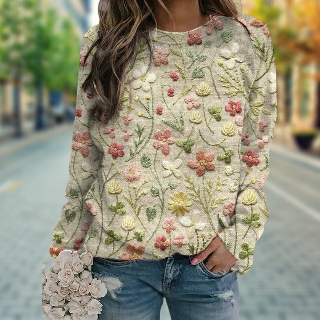 Elegant damegenser med unikt blomstermønster. Langermet, komfortabel og uformell genser for hverdagsbruk.