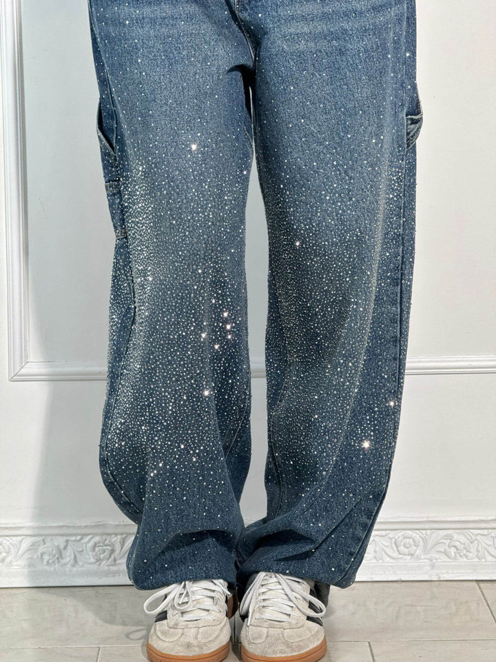 Turkis diamantjeans for kvinner med glitrende detaljer. Stilige bukser med romslig passform, egnet for fest og kos.