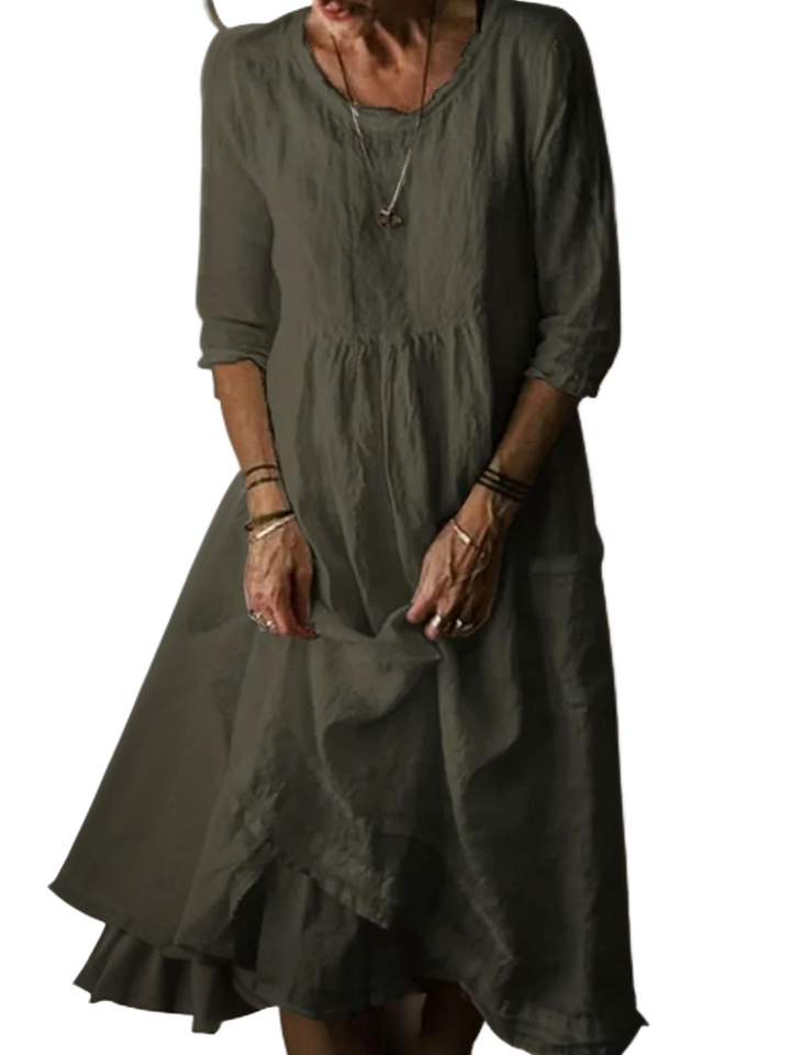 Elegant damekjole for hverdag og fest. Stilfull design, perfekt for vår og sommer.