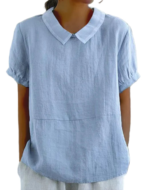 Klassisk damebluse med bubikrage, perfekt for kontor og fritid. Komfortabel og allsidig sommerbluse.