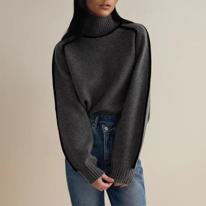 Dame rullekragegenser, vist på modell. En varm og elegant genser for en moderne og komfortabel stil.