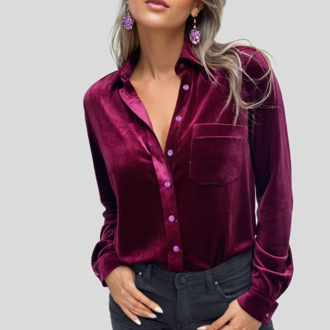Allsidig damebluse med knappelukking og klassisk stil, perfekt for både fest og avslappet hverdagsbruk.