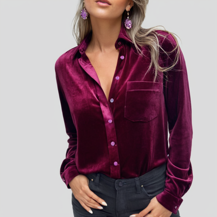 Allsidig damebluse med knappelukking og klassisk stil, perfekt for både fest og avslappet hverdagsbruk.