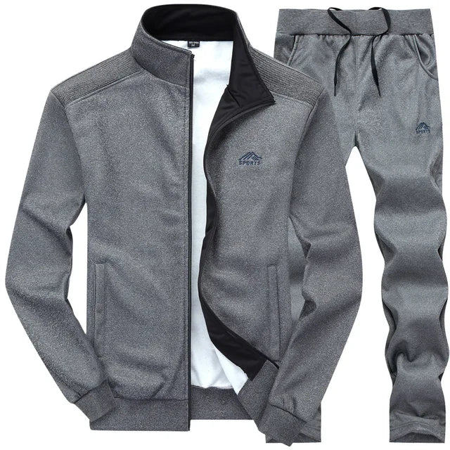 Stilfullt herre treningsdress sett, perfekt for høst og vår. Moderne design og behagelig polyester stoff.