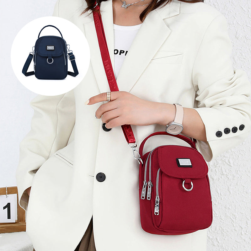 Moderne dameveske, vanntett crossbody-veske for reise og fritidsaktiviteter.