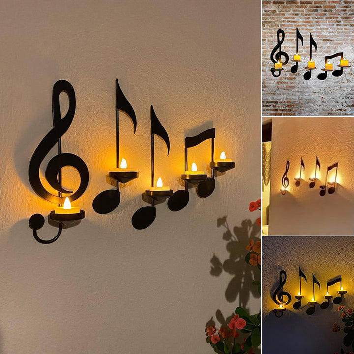 Svart veggmontert lysestake med unikt musikknoter og g-nøkkel design i metall. Hjemmedekor.
