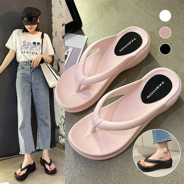 Profilbilde av kvinner's flip-flops med ekstra tykk bunn og ergonomisk design for støtte.