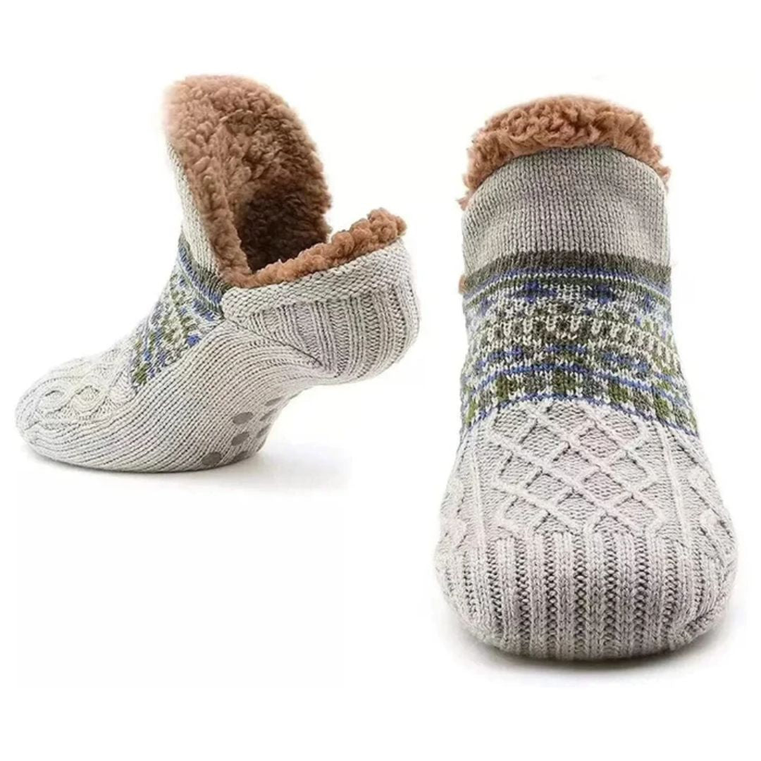 Myke, varme unisex innesokker med fleecefôr og sklisikker såle, perfekte for kalde dager.