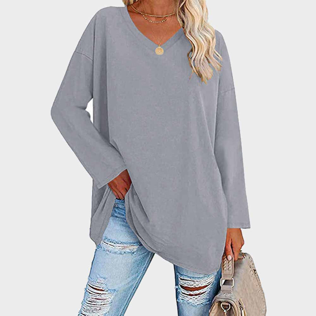 V-hals langermet bluse til dame, perfekt for en elegant og komfortabel hverdagsstil.