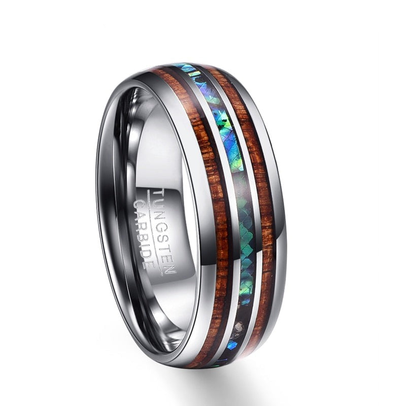 Slitesterk unisex wolframkarbidring med innlegg av Koa tre og glitrende abalone. Tidløs.
