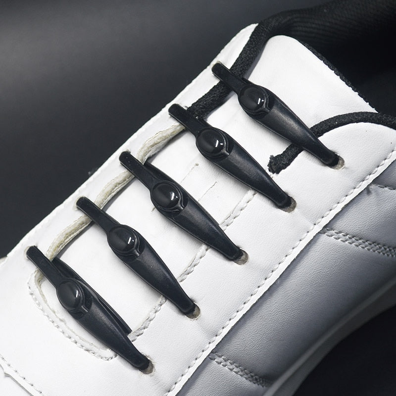 Svarte elastiske silikonlisser, essensielle for joggesko og sneakers, forbedrer komforten.