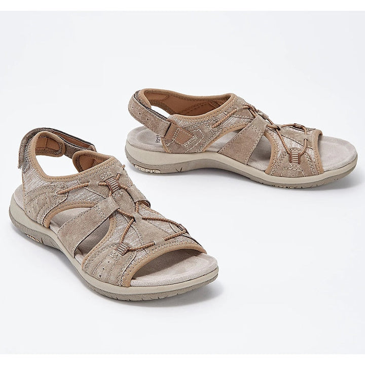 Elegante flate sandaler for kvinner. Støttende og komfortable, egnet for både vår og sommer.