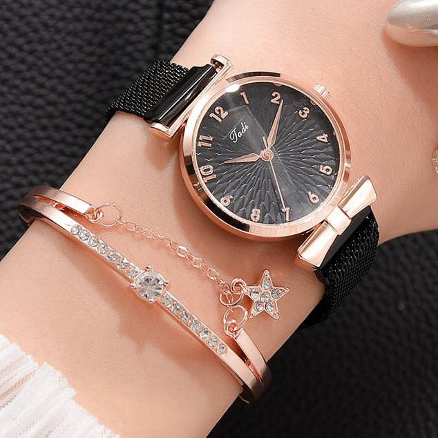 Glitrende dameklokke med justerbar magnetrem, et elegant armbåndsur som fanger lyset vakkert.