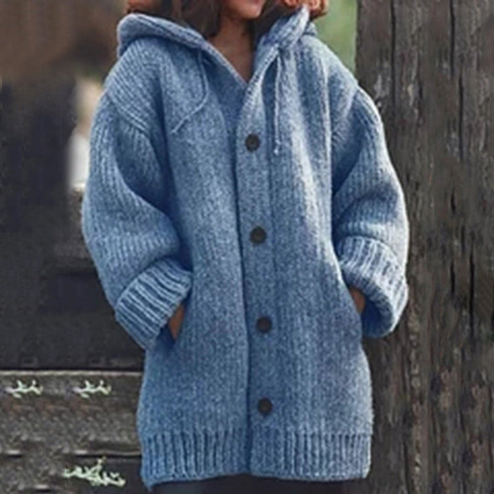 Dame cardigan strikket, kort modell med knapper, perfekt over bluse eller topp.