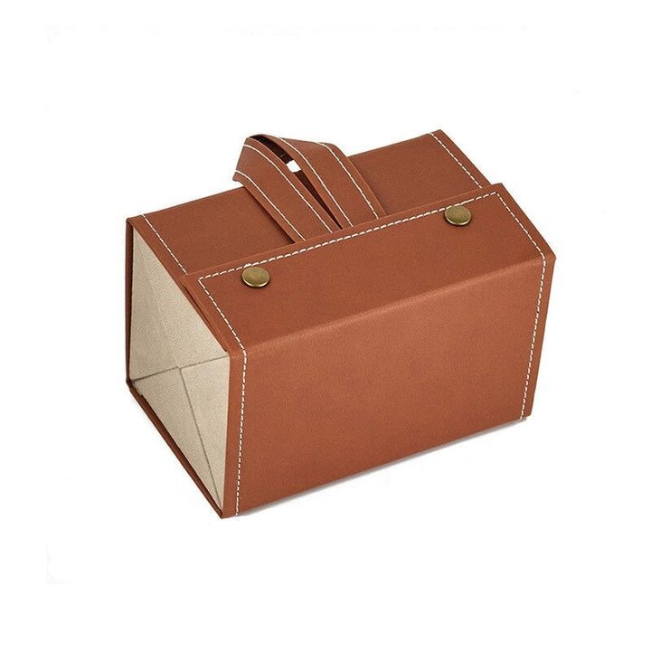 Elegant oppbevaringsløsning for briller: Sammenleggbart etui i vintage stil skinn.