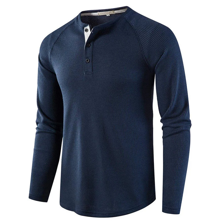 Stilren slim fit herre Henley t-skjorte med vaffelstruktur i bomull.