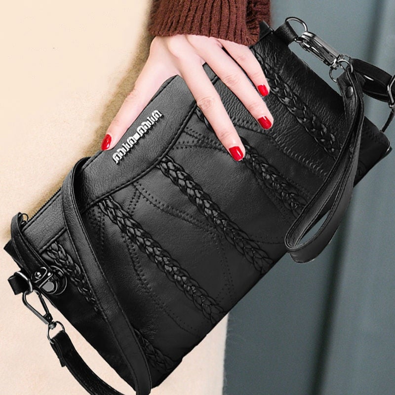 Stilig festveske for kvinner; elegant clutch og praktisk crossbody, perfekt for kvelden.