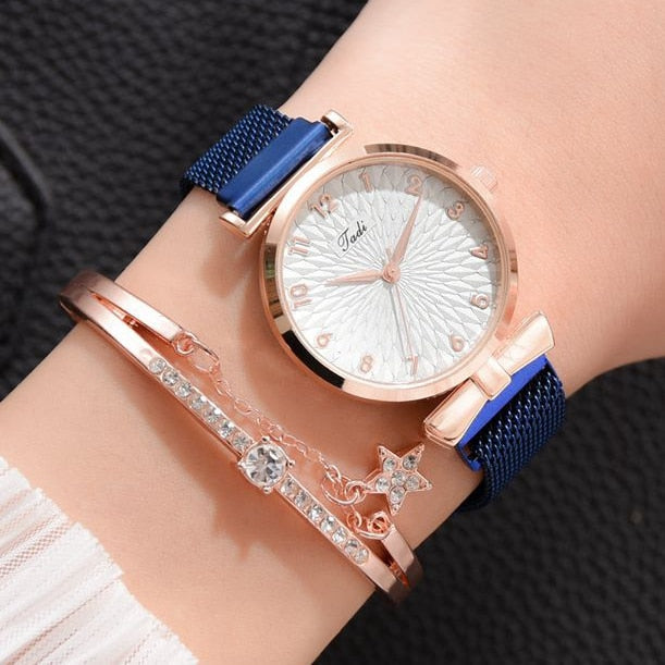 Skinnende dameklokke med glitrende urskive og lett magnetrem, et trendy og praktisk armbåndsur.