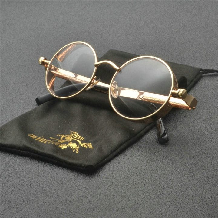 Unisex Rebel solbriller i legering og harpiks. Retro design med UV400 beskyttelse for stil, komfort og mote.