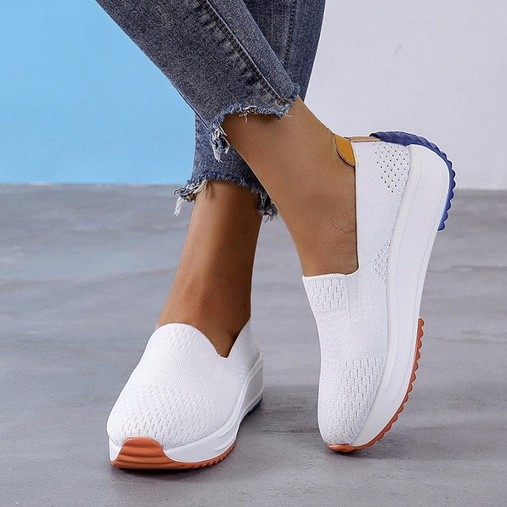 Dame sneakers for trening, med sklisikker såle og pustende design for optimal komfort.
