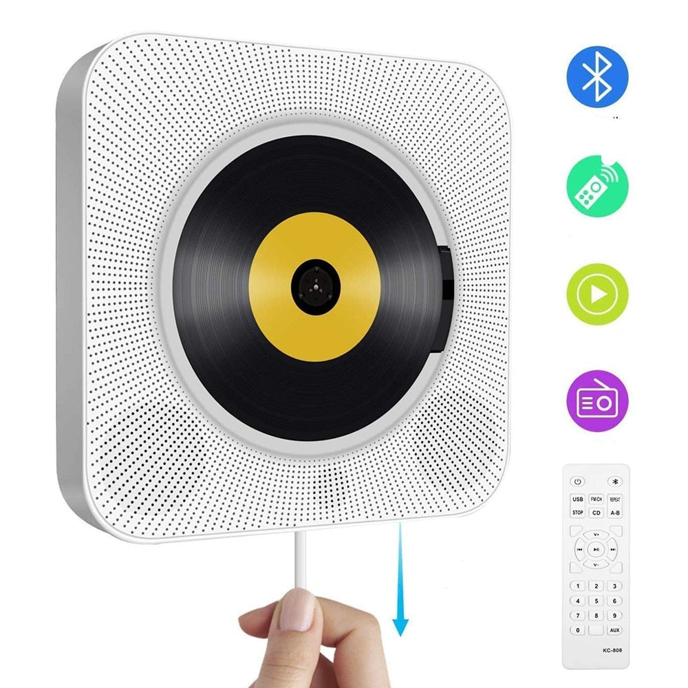 Moderne veggmontert bærbar CD-spiller med Bluetooth og fjernkontroll, hvit design.