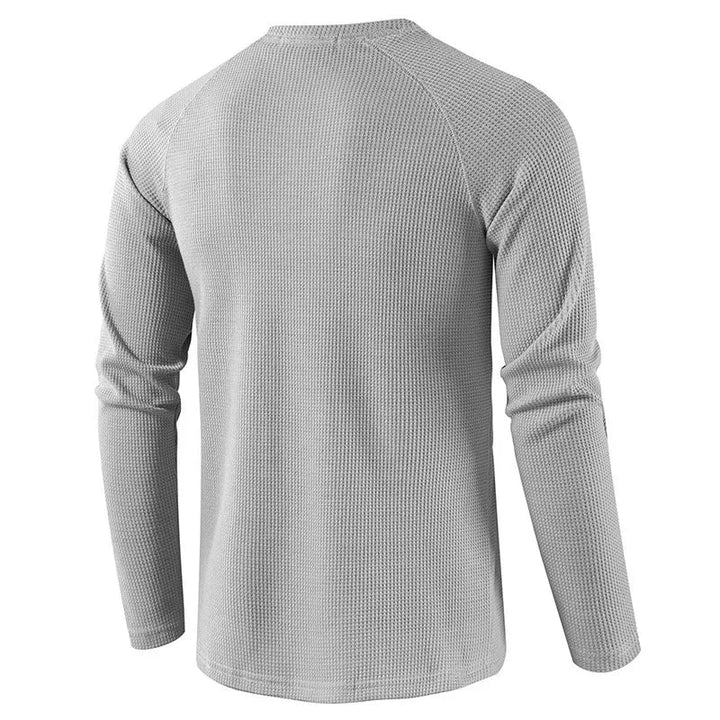 Ergonomisk designet herre Henley i vaffelbomull, lang erm og slim passform.