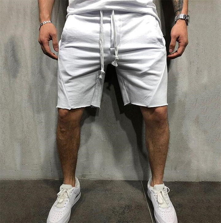 Løstsittende herreshorts som sikrer bevegelsesfrihet og komfort i sommervarmen.