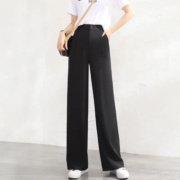 Komfortable polyester damebukser, løs passform med vide ben. Pustende og antistatiske.